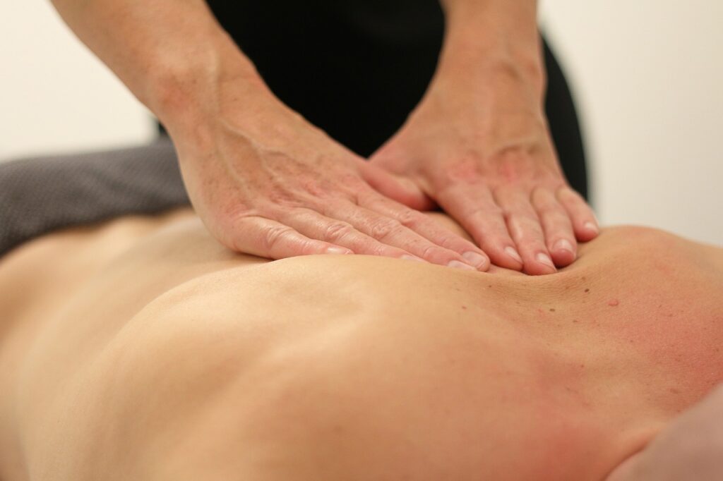Services at Aquarius Chiropractic 8 Aquarius Chiropractic Mobile Services. Man lying down, receiving deep soft tissue therapy.