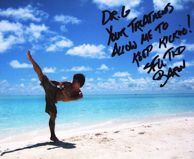 Vancouver Chiropractor at Aquarius Chiropractic 19 Martial Artist showing off his kicking flexibility. Aquarius Chiropractic helps loosen tight muscles.