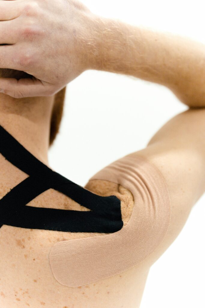 kinesio taping for postural correction